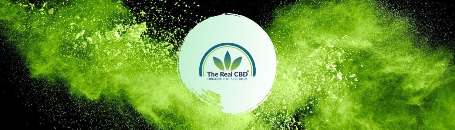header The Real CBD-logo på baggrund af grønt pulver
