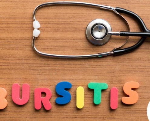 Bursitis plastbogstaver på et træbord
