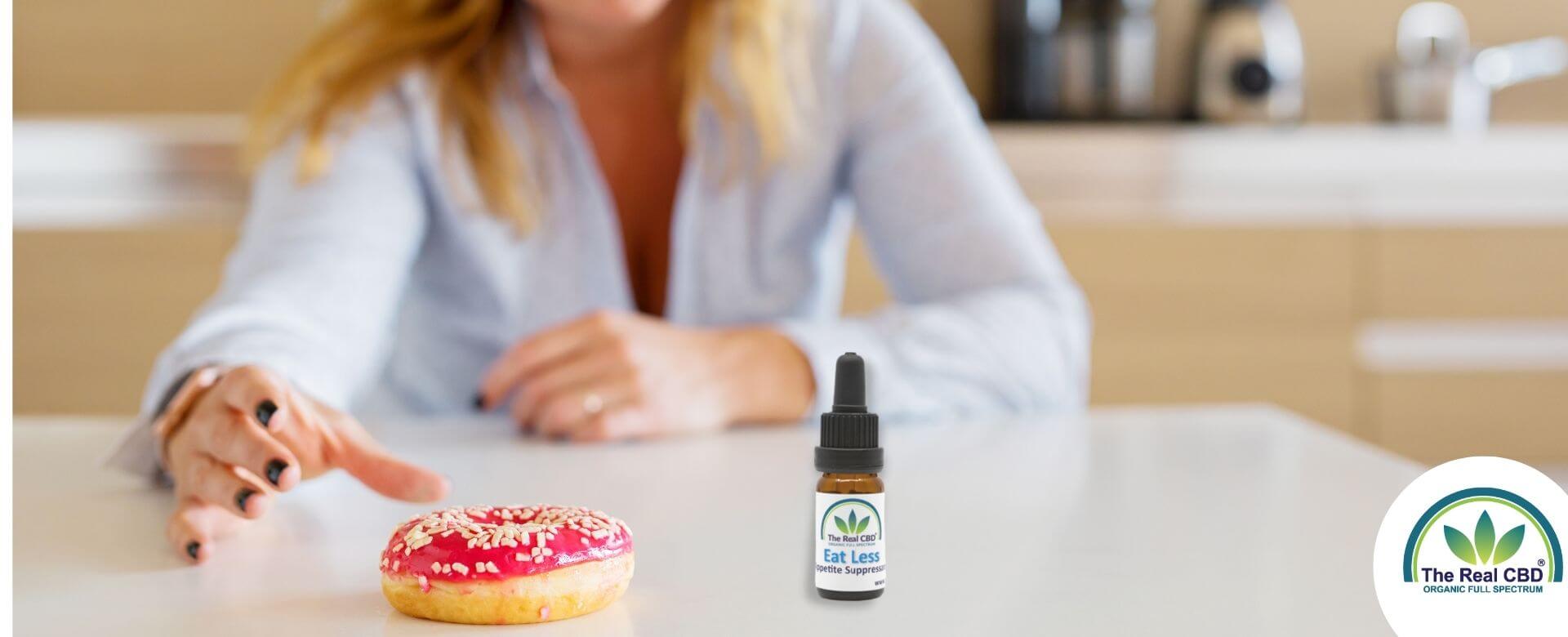 Woman reaching for a doughnut