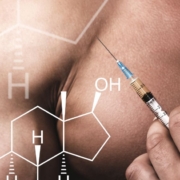 The Real-CBD-Blog-hjælper-CBD-med-testosteron Muskuløs mand med sprøjte, der vil give sig selv en indsprøjtning