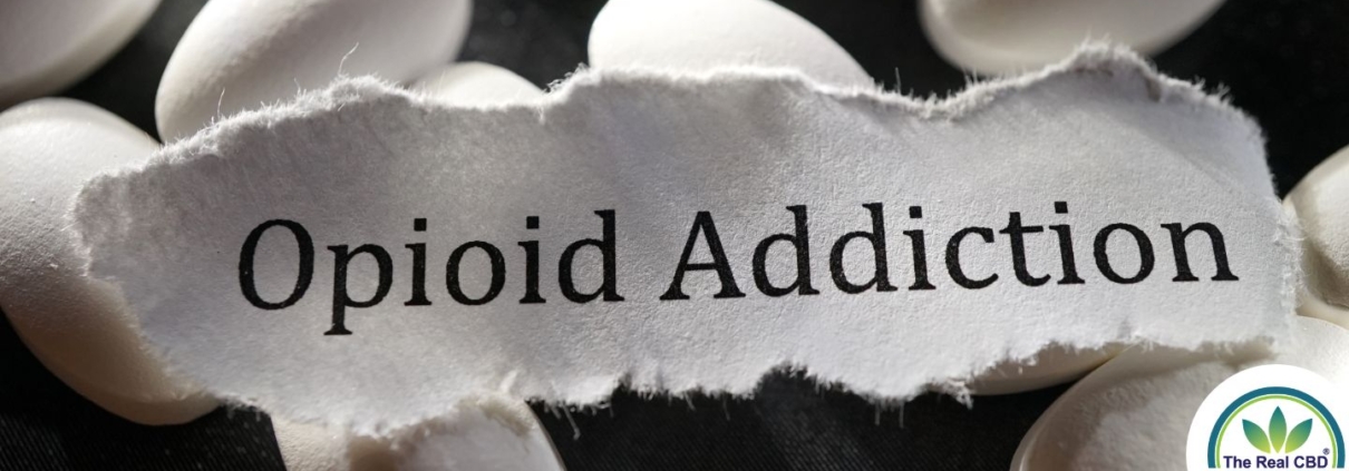 Opioidafhængighed på et hvidt papir med hvide piller