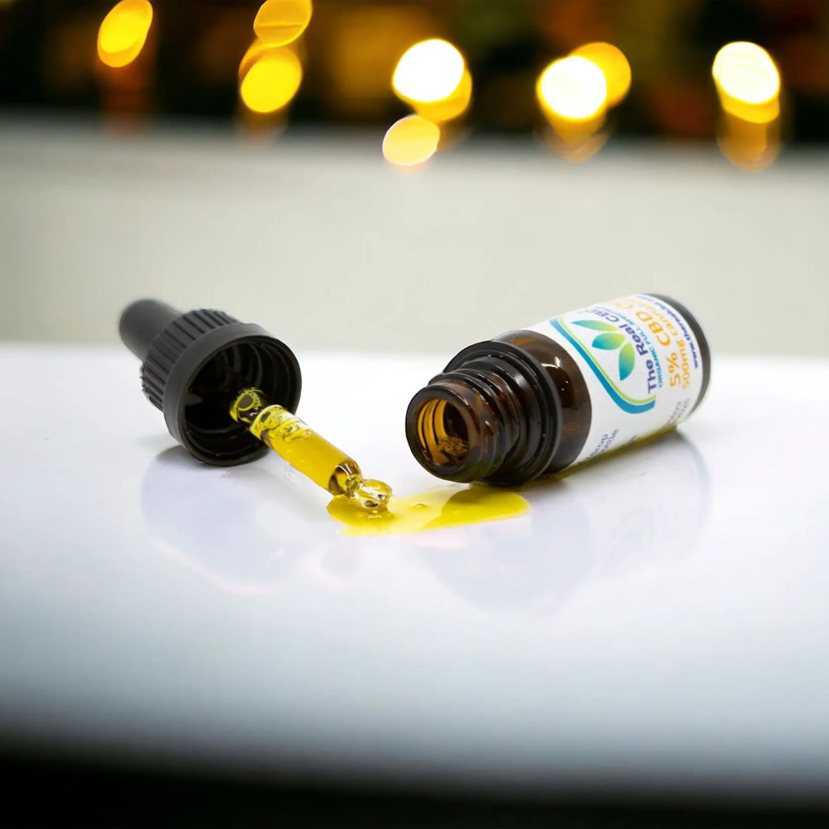 Væltet CBD flaske med olie spilt - The Real CBD