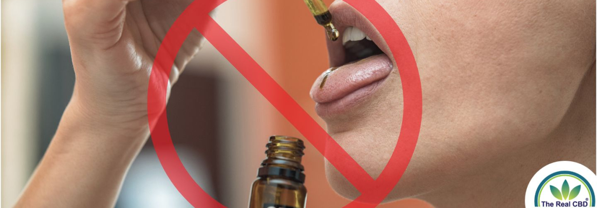 STOP skilt over en person som tager CBD olie