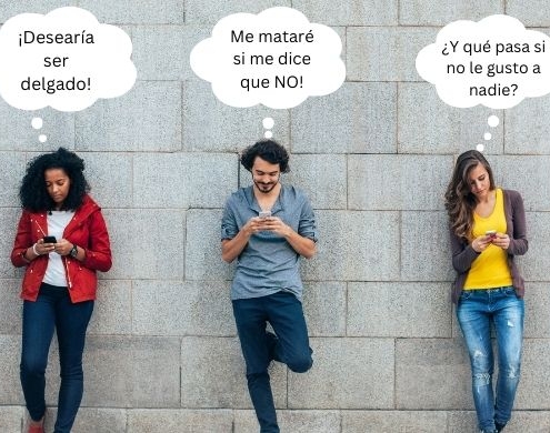 Adolescentes contra la pared con sus teléfonos
