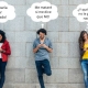 Adolescentes contra la pared con sus teléfonos