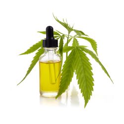 Frasco de tintura con aceite por una hoja de cáñamo