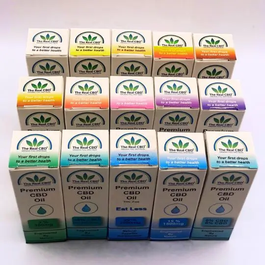 Cajas de CBD en diferentes colores - The Real CBD Marca