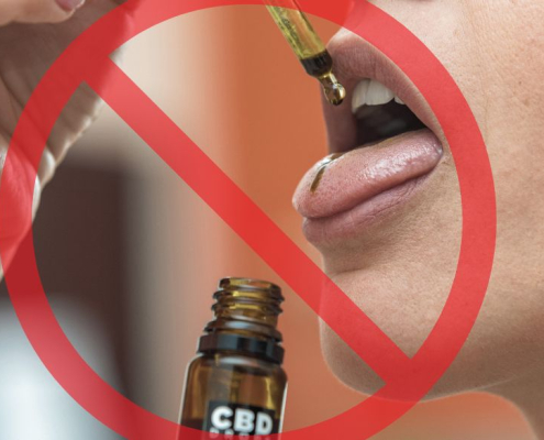 Señal de STOP sobre una persona que toma aceite de CBD