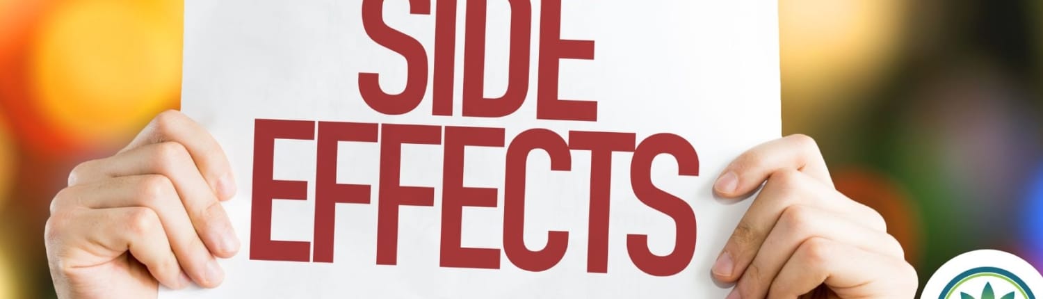 Hands holding SIDE EFFECT sign