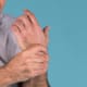 Man holding his wrist in pain