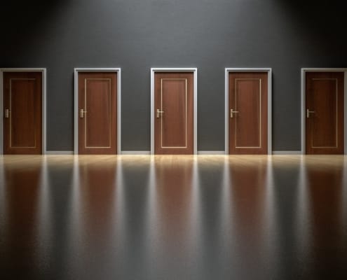 A line of closed doors looking alike