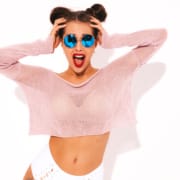 the real cbd surprised young woman Surprised woman in pink knitted jumper with mirror sunglasses