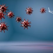 The-Real-CBD-Blog-Can-CBD-Boost-your-immune-system Illustrated man stopping flying bacteria