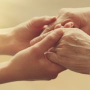 the-real-cbd-blog-cbd-for-alzheimers-and-dementia Young and old hand holding eachother