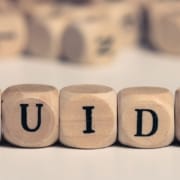 The-Real-CBD-Blog-Beginners-guide-to-CBD-1 GUIDE spelled on wood dice