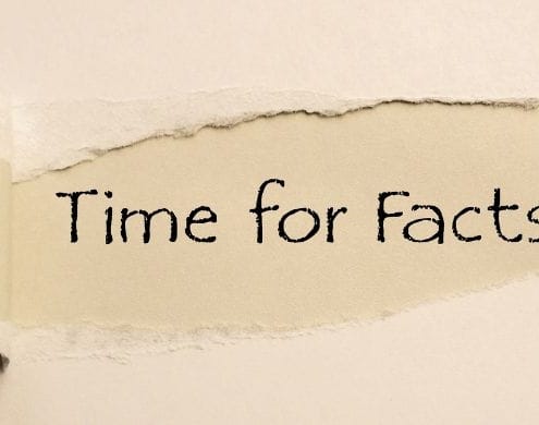 TIME FOR FACTS ripped open on cardboard