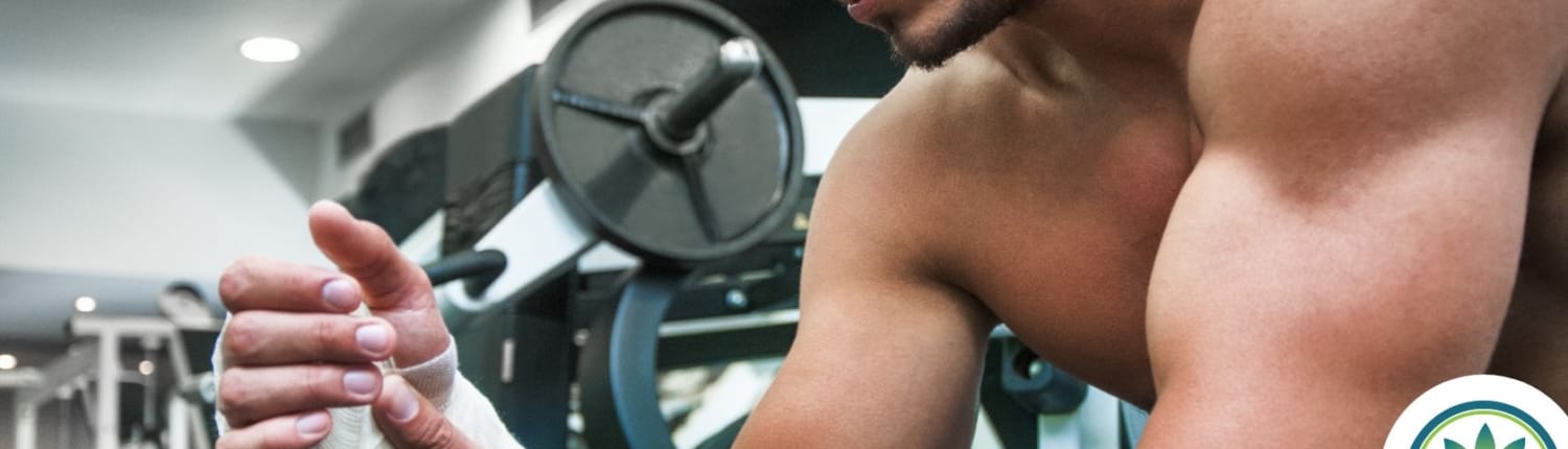 Injured man with bandage in a gym