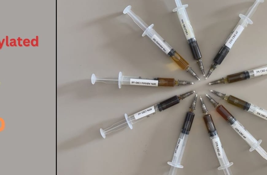 10 syringes laid out in a circle demonstrating different colours of CBD oil