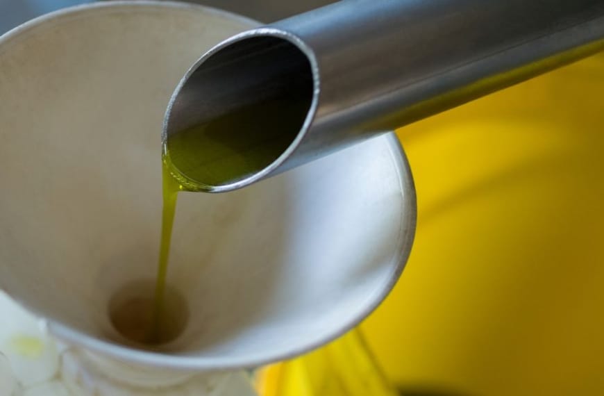 Oil running into a funnel