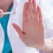 The Real CBD Blog Can CBD help quit smoking Doctor holding a cigarette asking to stop