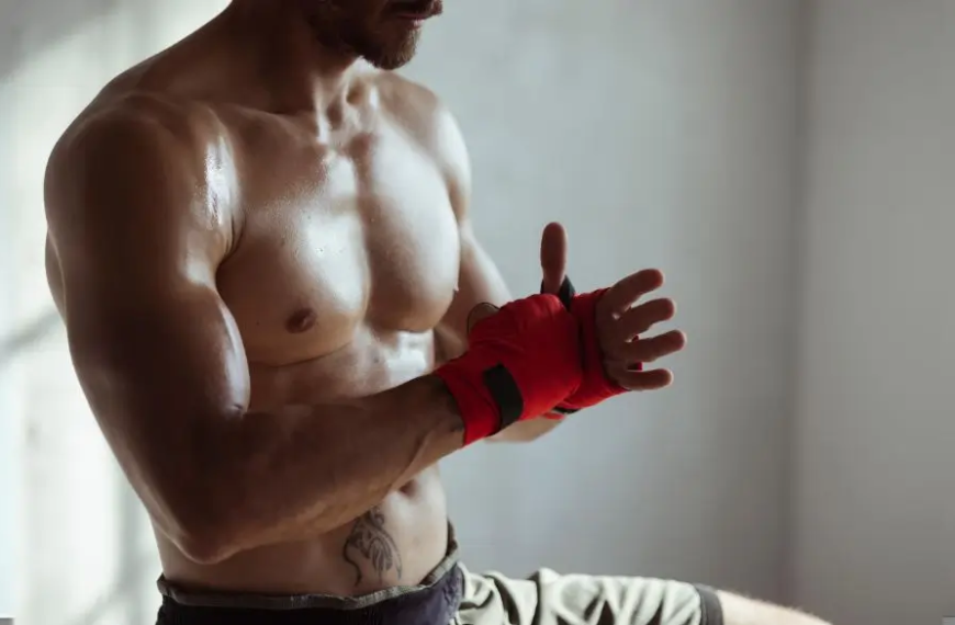 Man wrapping his hand to MMA fight
