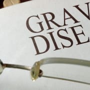 The-Real-CBD-Blog-CBD-for-Graves-disease Graves Disease journal on a doctors table