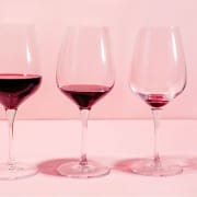 The-Real-CBD-Blog-can-CBD-help-you-sober-up A row of wine glasses with less and less redwine in