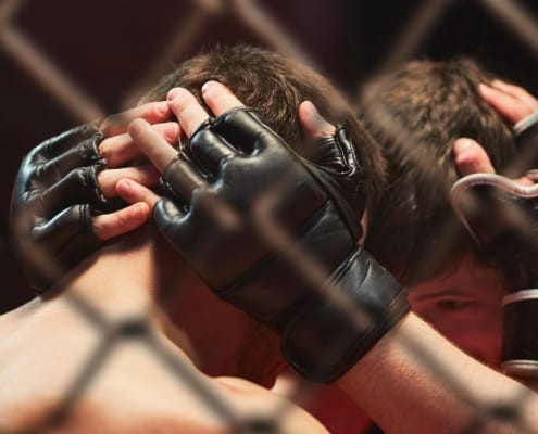 MMA fighters in combat