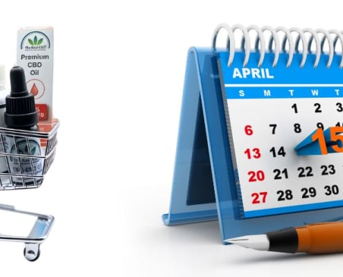 CBD-Produkte in einem Einkaufswagen neben einem Kalender mit einer Stecknadel