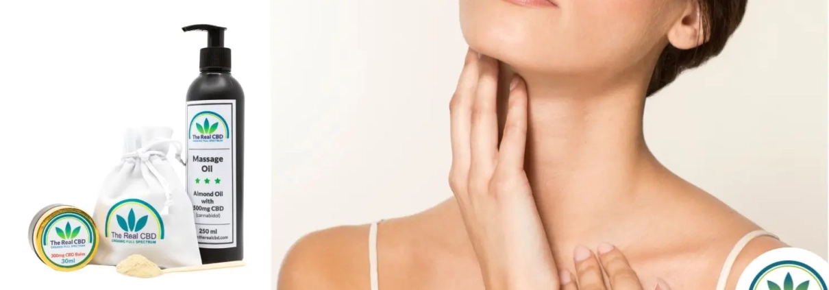 Woman applying crème on her neck