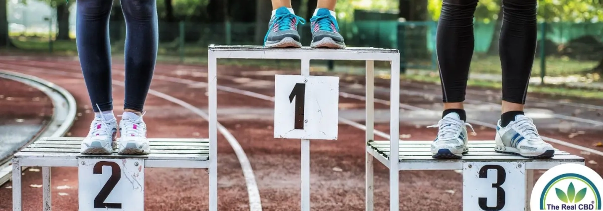 Competition podium 1 2 3 with only athletes feet visible