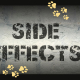 SIDE EFFECTS sign with paw prints and a cat