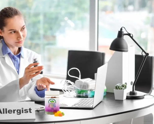 Doctors office where a patient is having an allergy and the doctor handing over a prescription
