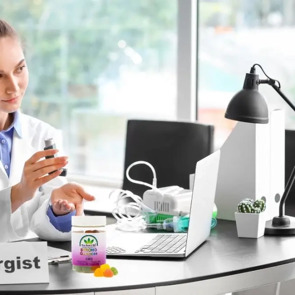 Doctors office where a patient is having an allergy and the doctor handing over a prescription
