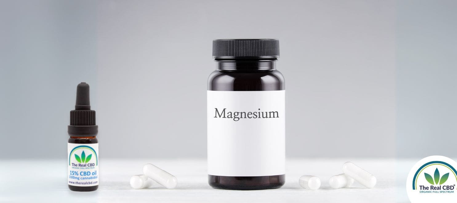 A tub of magnesium and a bottle of CBD oil