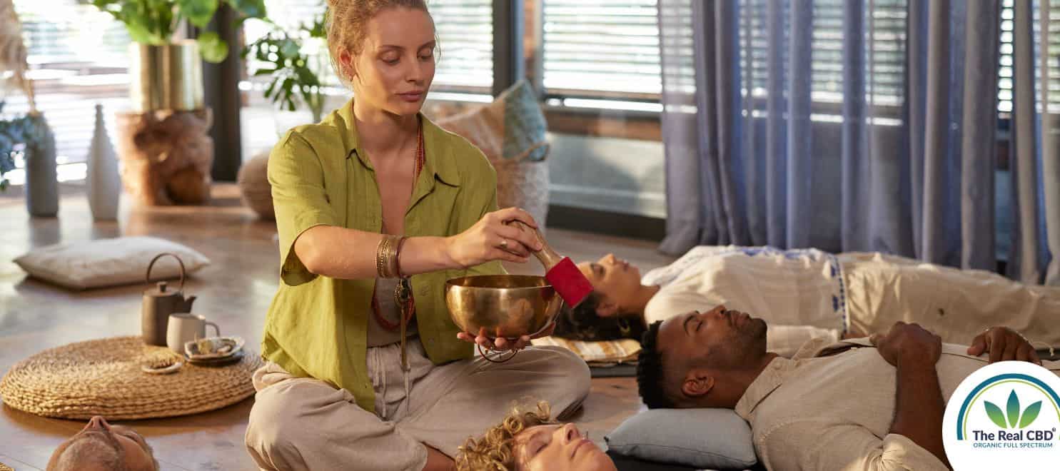 Woman performing a sound bath session