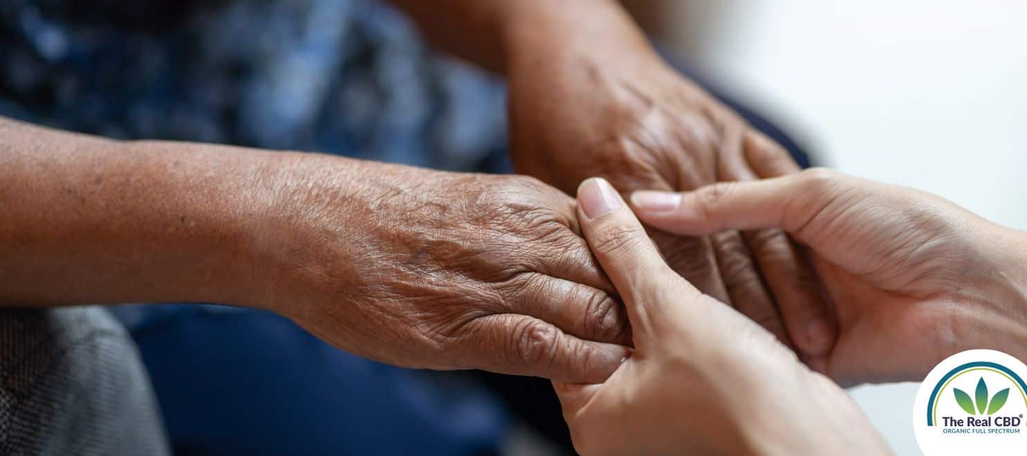 2 pairs of hands holding eachother.