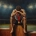Athlete sitting on 1st place podium lookinf tires and have given up