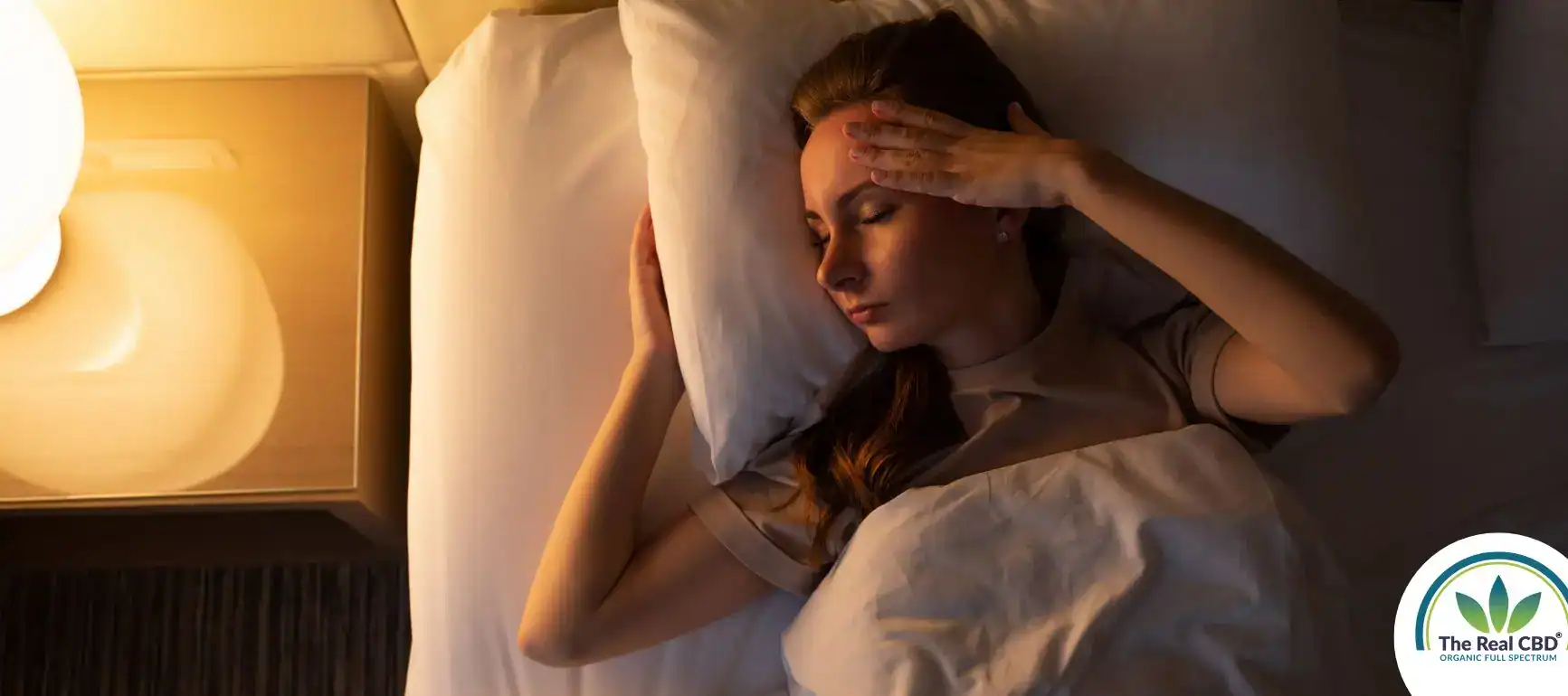 Woman laying in bed trying to sleep