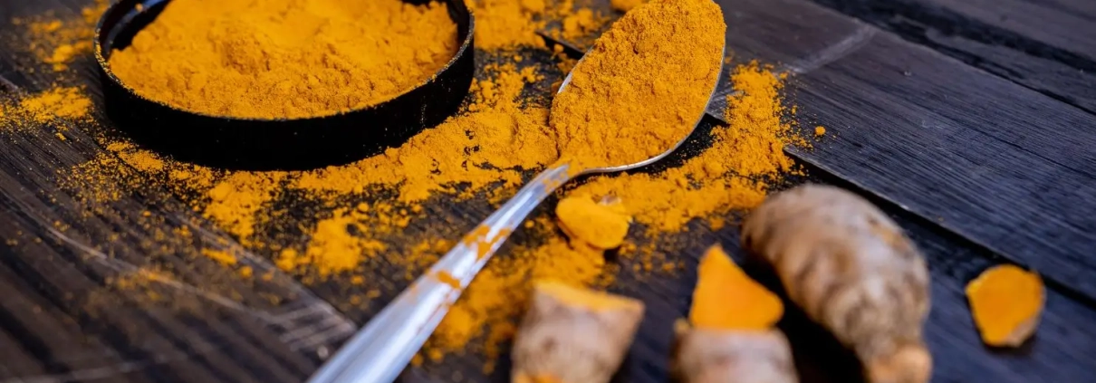 Curcumin powder on a table